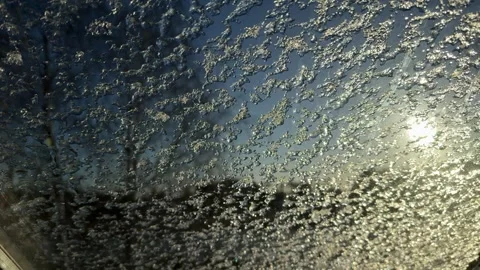Frost and ice crystals on a winter window Stock Footage 301085232