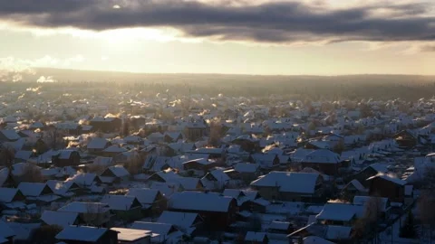 Frost and sun. Dawn in winter. Harmonious movement of clouds and smoke. Slow mov Stock Footage 169017526