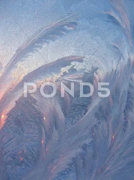 Frost and sunlight on glass Stock Photos