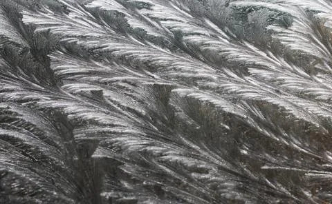 Frost on car window Pattern made from frost on a front window of a car Cop... Stock Photos
