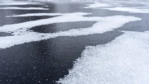 Frost crystals on surface of river ice. Cold winter background Foto stock