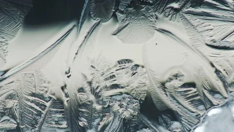 Frost draws a magical pattern. Christmas winter background for postcard. Stock Footage 233429643