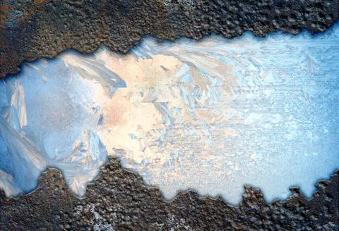 Frost in the frame of rusty metal Stock Photos