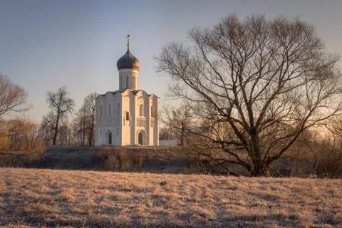 The frost on the grass blazes in the rays of the cold, blooming sun, beauti.. Stock Photos
