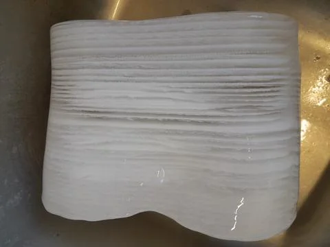 Frost ice bar. Solid chunk of layered freezer frost ice Stock Photos