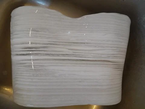 Frost ice bar. Solid chunk of layered freezer frost build up ice. Stock Photos