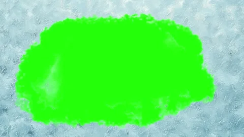 Frost pattern dissolving to green screen background Видео 319436694