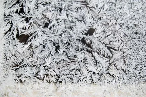 Frost pattern on the window, cold winter Stock Photos