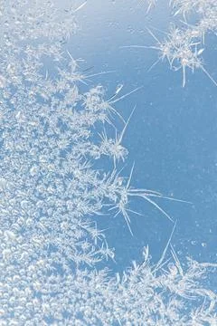 Frost pattern on window glass as background Stock Photos