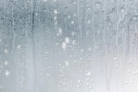Frost pattern on window glass as background Stock Photos