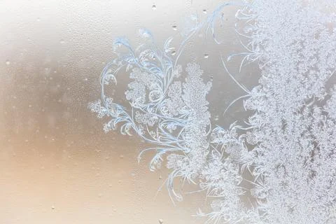 Frost pattern on window glass as background Stock Photos
