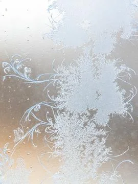 Frost pattern on window glass as background Stock Photos