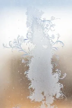 Frost pattern on window glass as background Stock Photos