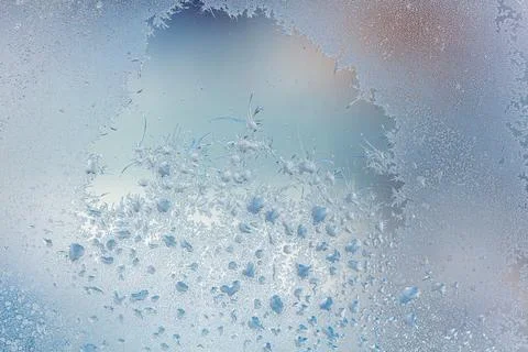 Frost pattern on window glass as background Stock Photos