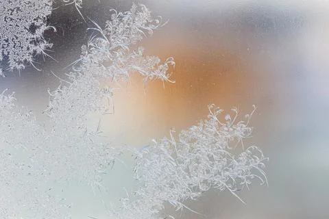 Frost pattern on window glass as background Stock Photos