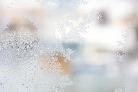 Frost pattern on window glass as background Stock Photos