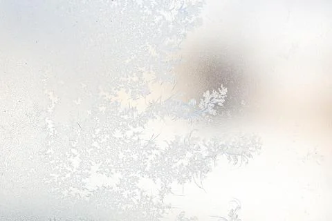 Frost pattern on window glass as background Stock Photos
