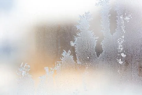 Frost pattern on window glass as background 写真素材