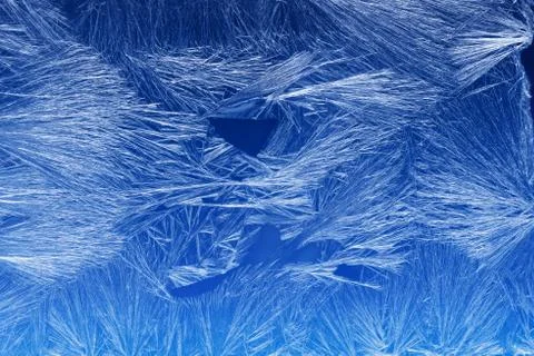 Frost pattern on a window glass Stock Photos