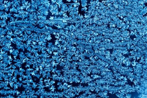 Frost pattern on the window Stock Photos