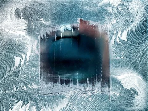 Frost patterns form on a window in a cold climate during the winter season Stock Photos