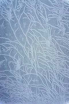 Frost patterns on window of Winter strong frost Siberia Stock Photos