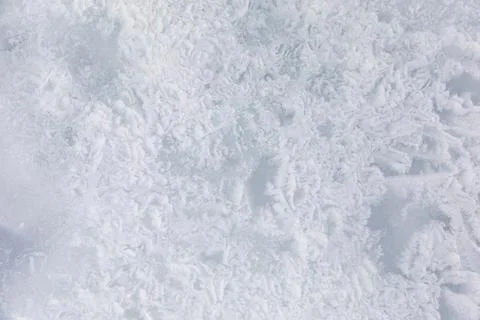 Frost patterns on winter ice surface at Lake Baikal, natural frozen texture Stock Photos