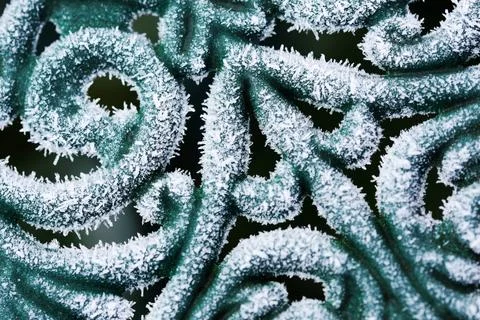 Frost on surface of ornate table close up 스톡 사진