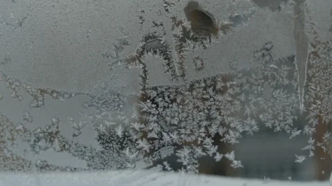 Frost on the window glass. Video stock 258296466