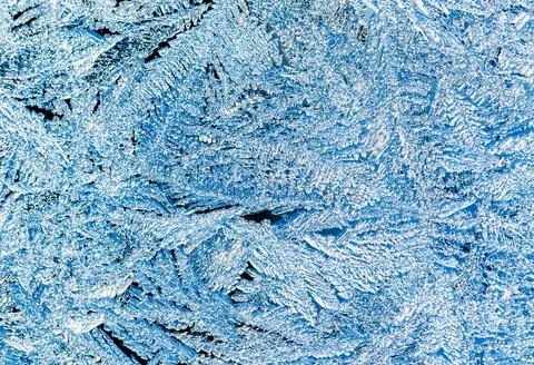 Frost on a window in winter Stock Photos