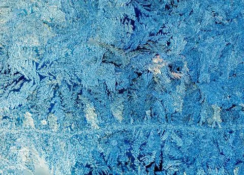 Frost on a window in winter Stock Photos