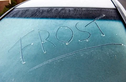 Frost written on car screen Stock Photos