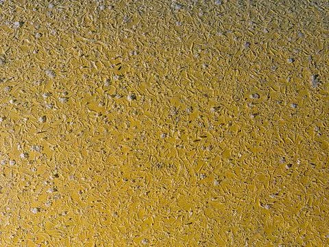 Frost on a Yellow Pipe in a Cold Environment During Winter Morning Hours Stock Photos