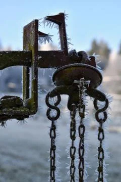Frostbitten old weight. Stock Photos