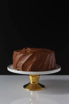 Frosted Chocolate Cake on Stand Stock Photos