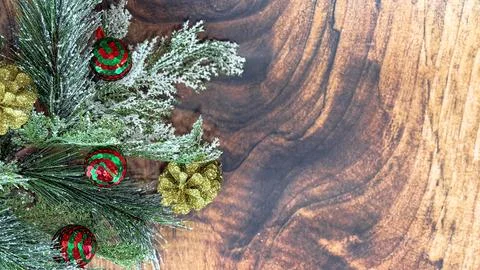 Frosted Christmas tree branches with red and green ornaments Stock Photos