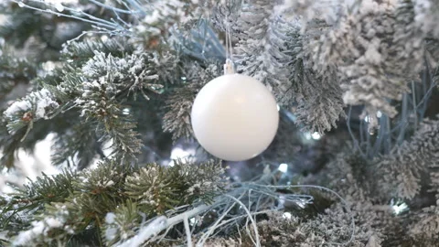 Frosted Christmas tree with white ornament Stock Footage 319955351
