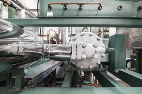 The frosted head of the compressor of the refrigerating machine. Stock Photos