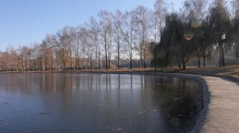 Frosted pond in fall park Stock Footage 45576391