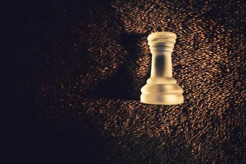 Frosted Rook chess piece on dramatic background Stock Photos