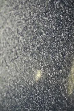 Frosted Surface with Intricate Snowflake Patterns Under Soft Light Stock Photos