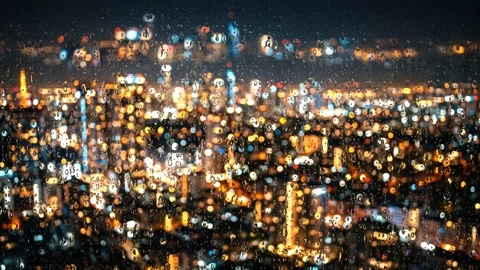 Frosted window with glowing city bokeh lights at night. 4K 스톡 동영상 343244174