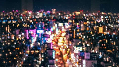 Frosted window pane with raindrops and colorful bokeh lights. 4K Video stock 343244132