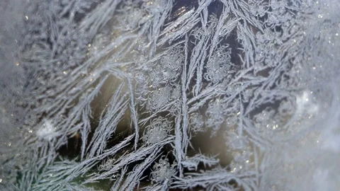 Frosted Window Pattern Rotating and Zooming Out Stock Footage 234875341