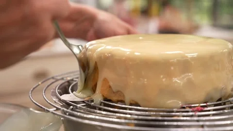 Frosting the cake Stock Footage 254423271