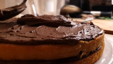 Frosting sponge cake chocolate-cocoa paste,cream, paste,glaze impregnation Stock Footage 313056133