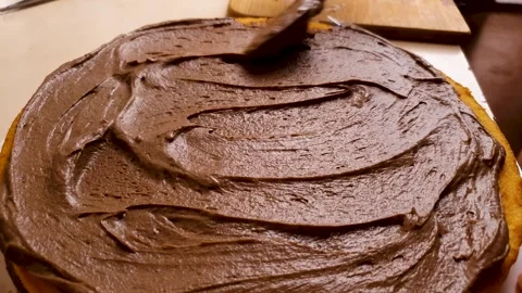 Frosting sponge cake chocolate-cocoa paste,cream, paste,glaze impregnation Stock Footage 313056228