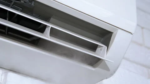 Frosty air from conditioner on wall Stock Footage 295894500