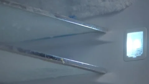 Frosty Empty Freezer With Glass Shelves And Cold Steam Air Getting Out, Concept Stock Footage 285164773