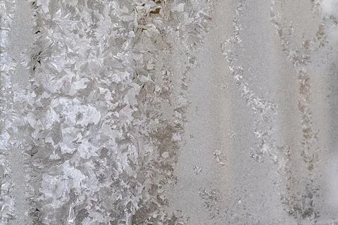 Frosty glass with an abstract pattern Stock Photos